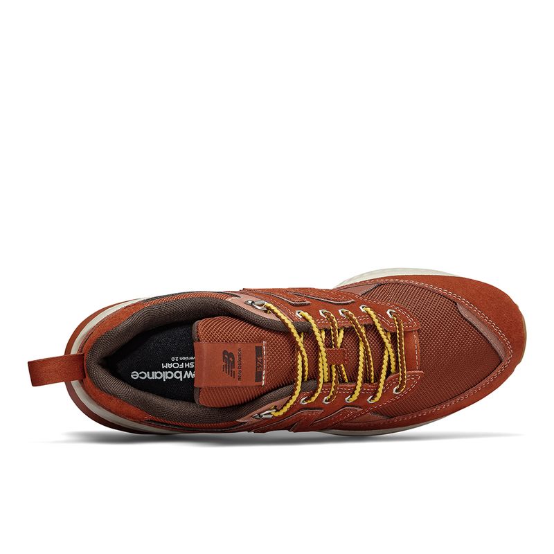tenis new balance masculino marrom couro